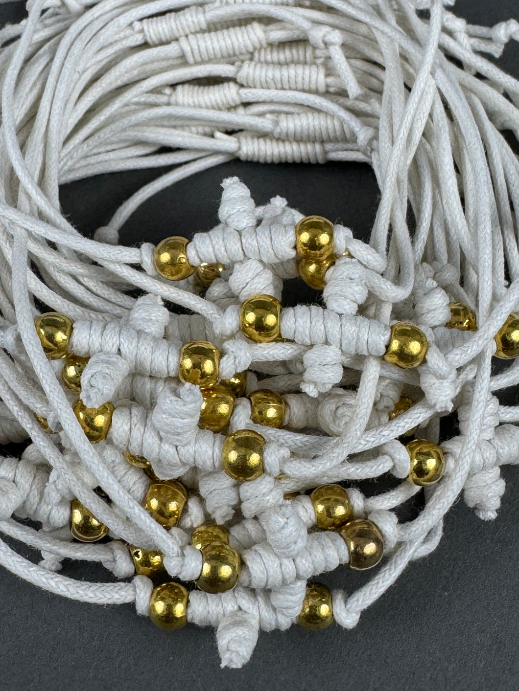 Martirika Bracelets adjustable Koboskini Style White with Gold    Beads (per dozen)