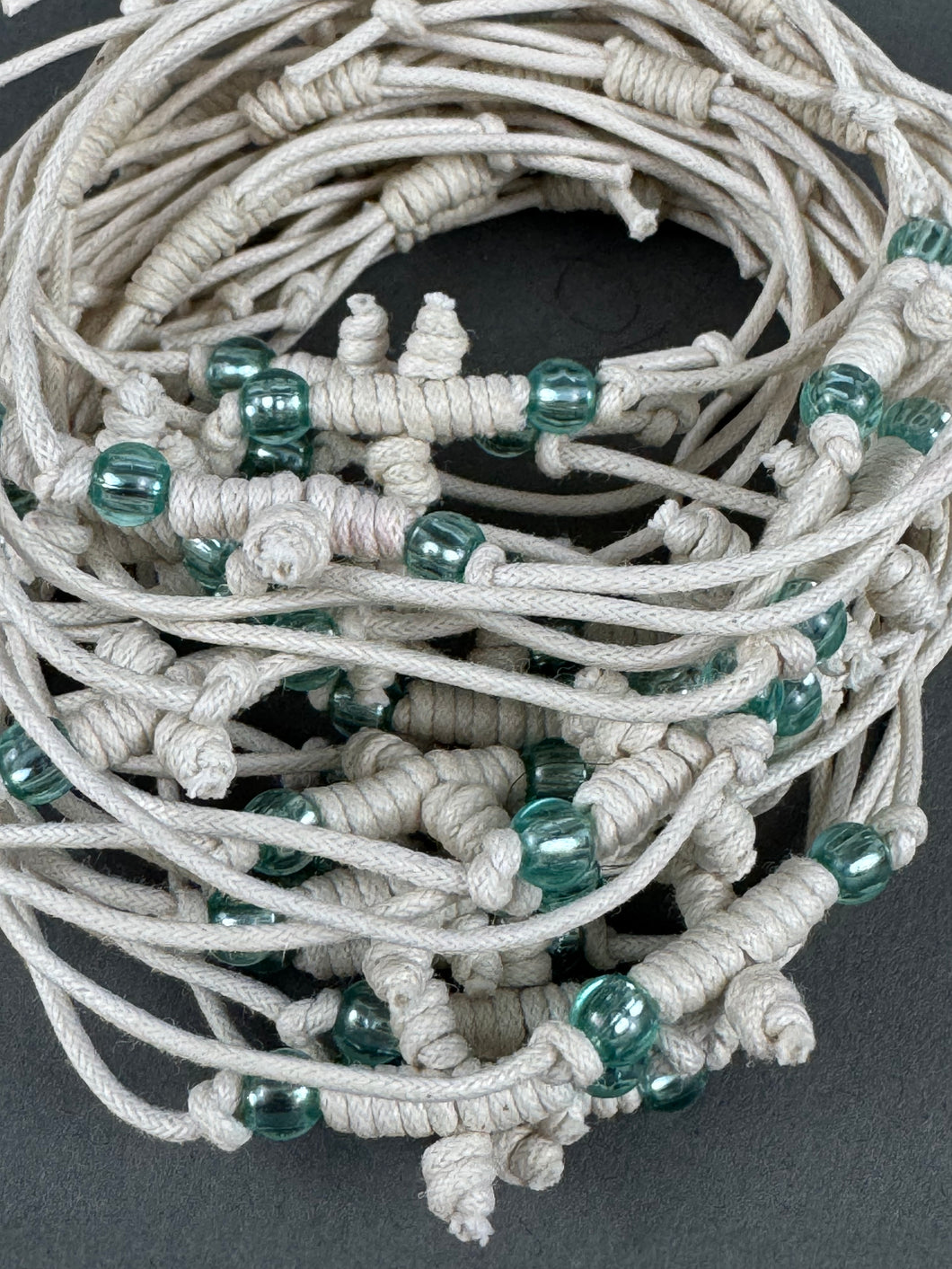 Martirika Bracelets adjustable Koboskini Style White  with Light Blue Beads (per dozen)