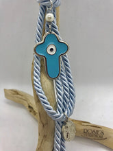 Load image into Gallery viewer, Gouri 27 Baby Blue Rope With Large Metal Baby Blue Cross With Mati and Hanging Panagia Pendant
