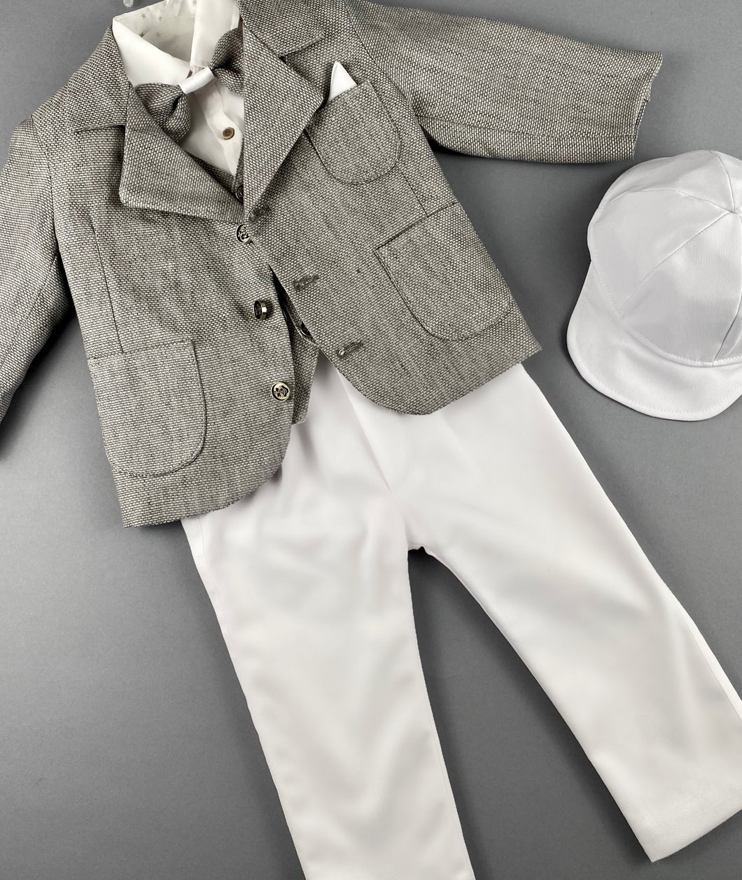 Rosies Collections 7pc full suit, Dress shirt with cuff sleeves, Bow Tie, Pants, Jacket with Matching Vest,  Belt or Suspenders & Cap. Made in Greece exclusively for Rosies Collections S201928