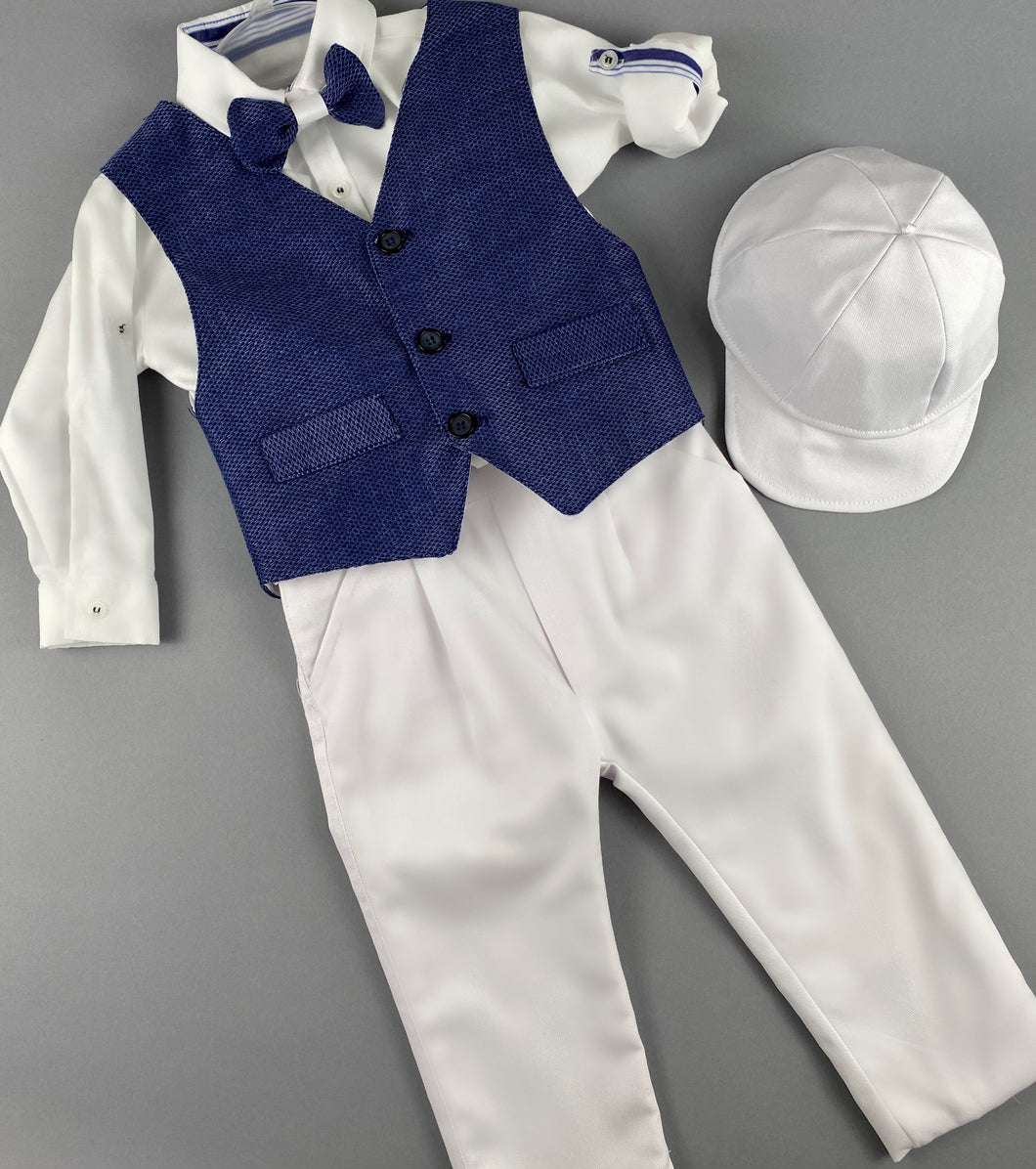 Rosies Collections 7pc full suit, Dress shirt with cuff sleeves, Bow Tie, Pants, Jacket with Matching Vest,  Belt or Suspenders & Cap. Made in Greece exclusively for Rosies Collections S201927