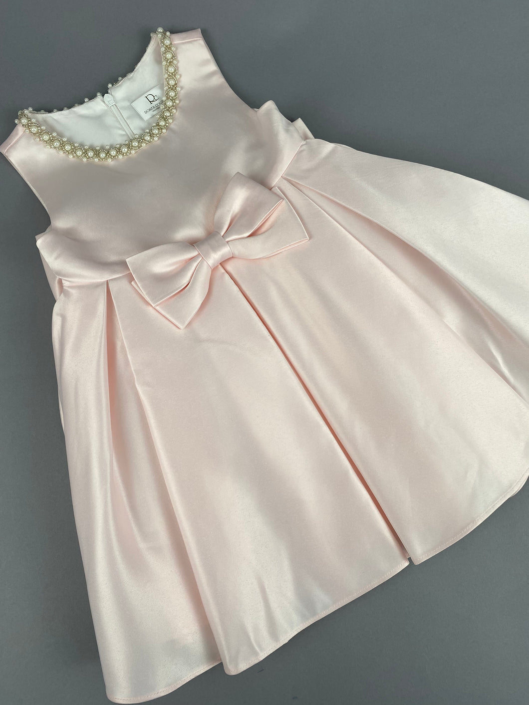 Dress 102 Girls Baptismal Christening Sleeveless Soft Pink Satin Dress with Pearl Neckline and Matching Balero. Made exclusively for Rosies Collections