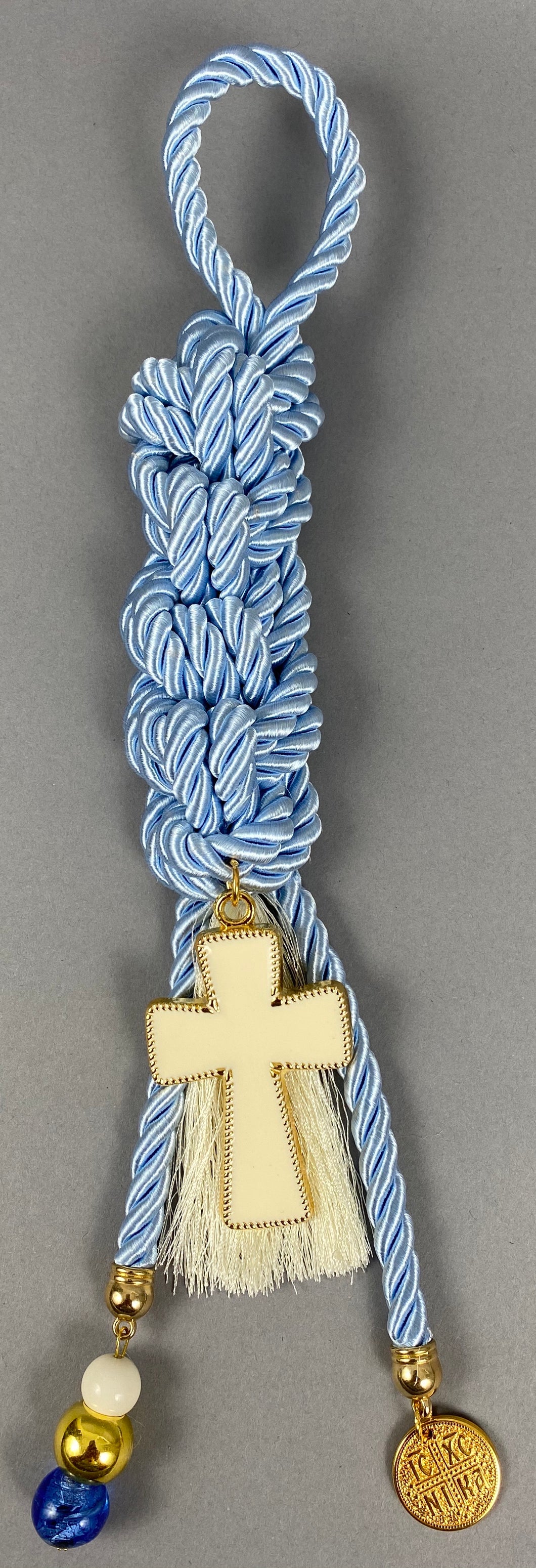 Gouri 1001 Pearl Baby Blue Cord Gouri, large metal Cross, double sided  Konstantinata  pendant, large beads with Murano Glass and Tassel.  Measures 13.5” in length.